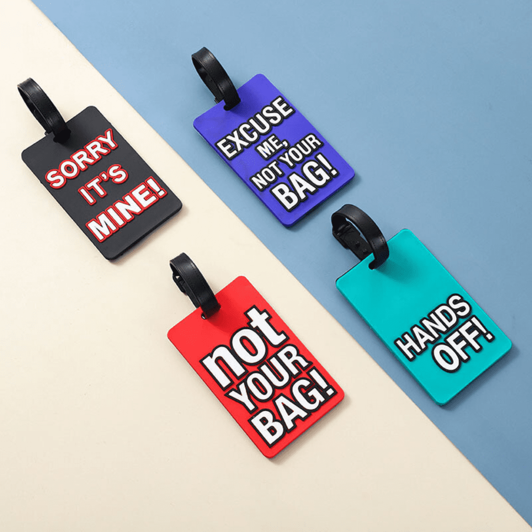 Colorful luggage tags featuring humorous ownership messages for easy identification and personal expression.