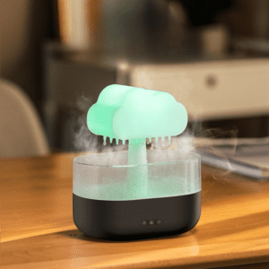 Whimsical cloud humidifier with green light, perfect for cozy home decor and relaxation.
