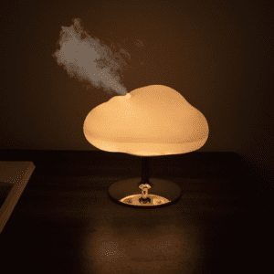Whimsical cloud lamp humidifier with warm glow, perfect for cozy decor in Singapore homes.