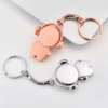 Stylish rose gold and silver cute headphone keychains for gifts or personal use.