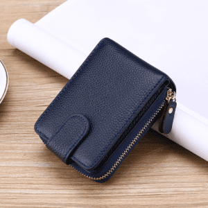 Stylish navy blue leather wallet with zip-around closure, perfect for elegant everyday use.