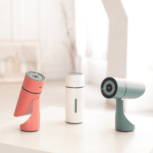 Stylish portable fans in pastel colors, perfect for modern home decor and cooling solutions.