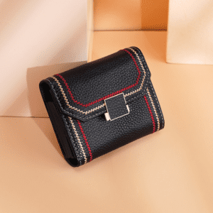 Stylish black leather wallet with red stitching, perfect for elegant corporate gifts in Singapore.