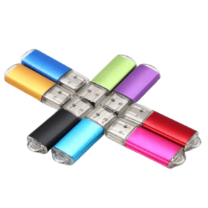 Colorful USB flash drives arranged artistically, showcasing modern design and vibrant hues for corporate gifts.