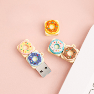 Whimsical donut USB flash drive, colorful design, perfect tech accessory for gifts and collectors.