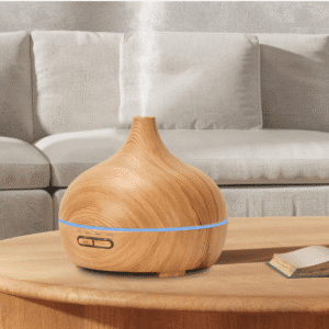 Elegant wooden aroma diffuser on a coffee table, enhancing relaxation in a cozy living room.
